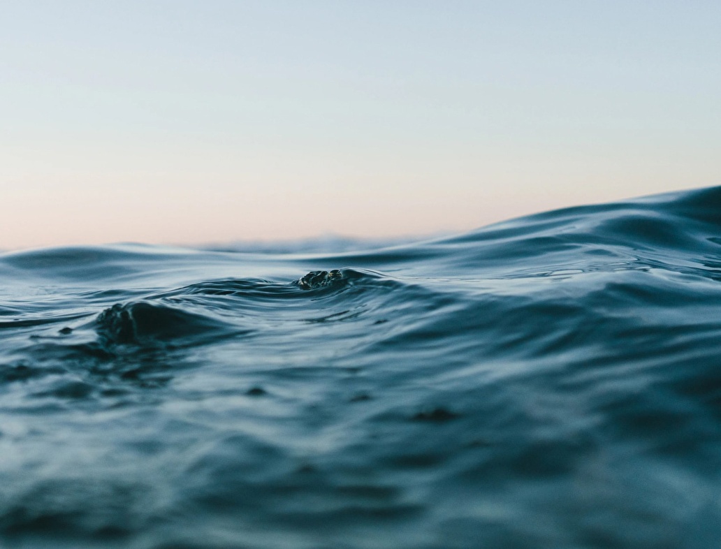 Close-up photography of sea waves reinforcing Lobelia's brand values.