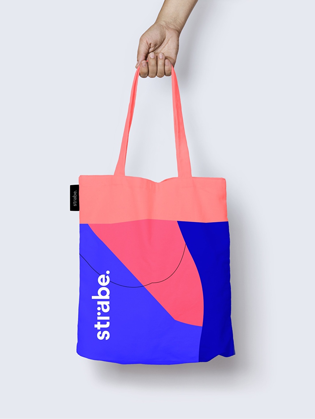 Ejemplo de merchandising que incluye la identidad de marca definida para Strabe.